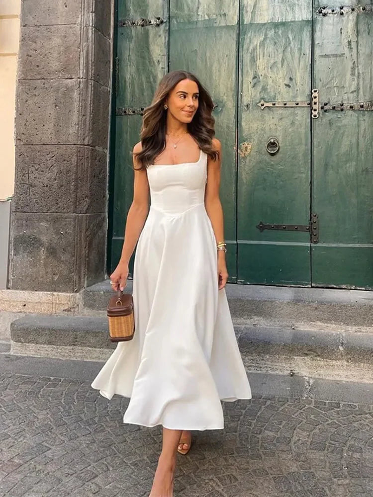 SERENA MUSE SLEEVELESS MIDI DRESS