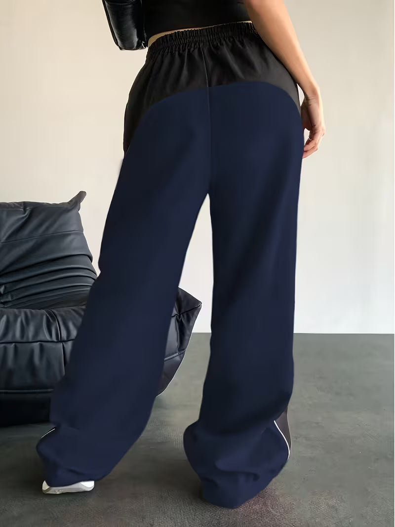 OLEO STRIPED WIDE LEG PANTS