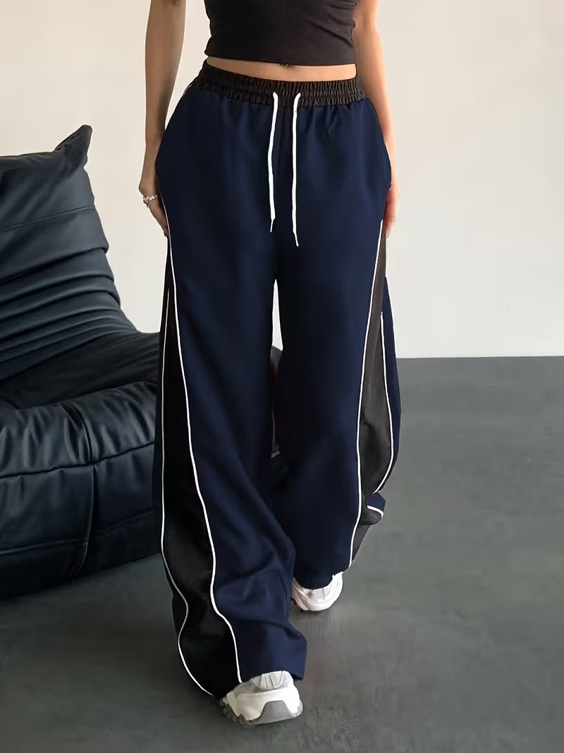 OLEO STRIPED WIDE LEG PANTS